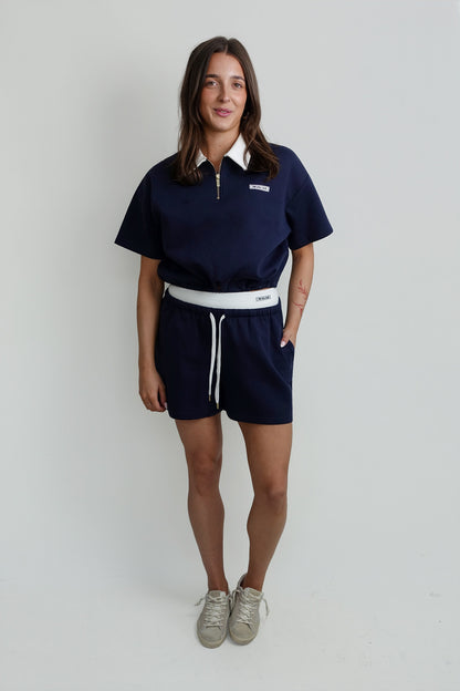 THE LOLA CLUB MILLIE POLO TEE NAVY