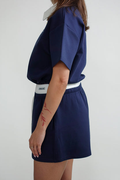 THE LOLA CLUB MILLIE POLO TEE NAVY